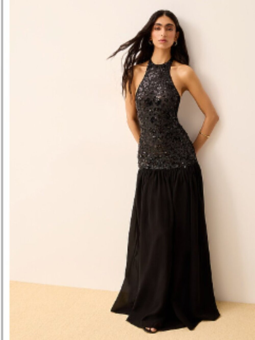 Floor-length black chiffon dress with sequins